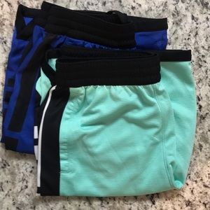 NIKE shorts.  Never worn. 2 pairs.  Size XL boys. For about 12 year old and up